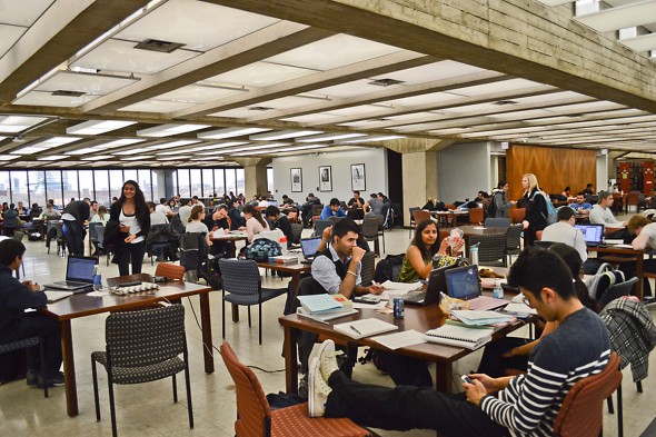 The fourth floor of the Daley Library is often the most crowded — it’s a great place to work on homework and socialize, students say. Photo: Alex Rauch 