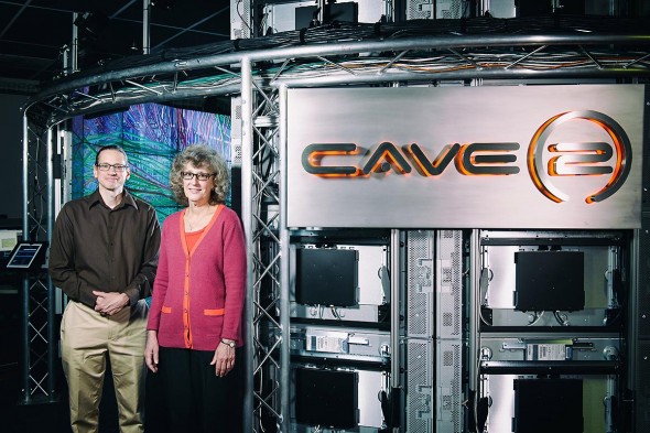 Andrew Johnson and Maxine Brown in front of CAVE2, advanced 3-D environment
