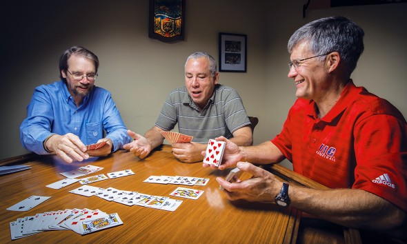 Subject (Left) Don Arnold ‘76, (Center) Craig Skweres ‘77 and (Right) Pat Bauer ‘76, play cards every Thursday night.