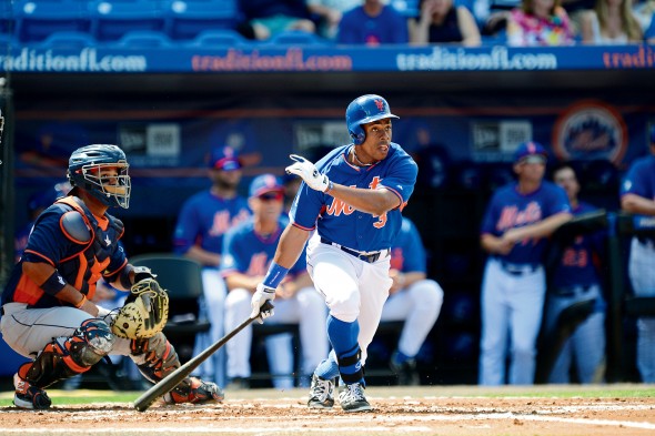 Curtis Granderson watches his hit as he leaves home plate