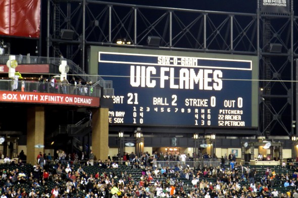 U.S. Cellular Field scoreboard reading "UIC FLAMES"