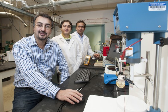 Amin Salehi- Khojin, asst professor of mechanical and industrial engineering  in the lab with Mohammad Asadi, graduate student and Bijandra Kumar, post doc where they are doing research in graphene sensors. Photo: Roberta Dupuis-Devlin/UIC Photo Services