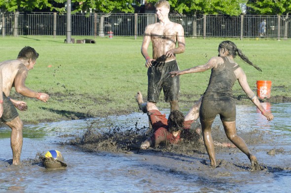 student falling in the muddy water