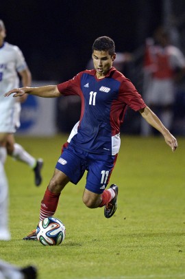 Jorge Alvarez with the ball