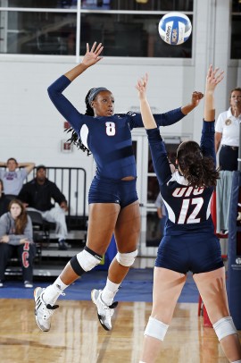 Stephenee Yancy leaping to make a spike