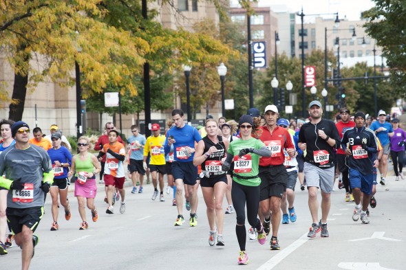 Chicago Marathon runners pass the UIC campus