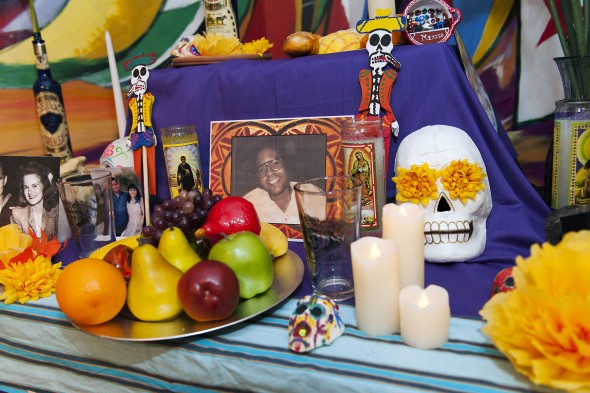 Day of the Dead altar at the Latino Cultural Center with a photo of Rafael Cintrón