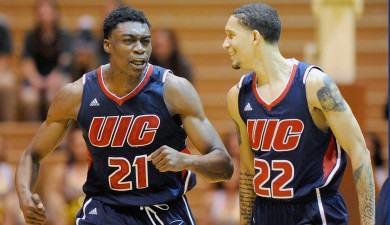 Tai Odiase, left, and Jay Harris after UIC men's basketball win against Oakland