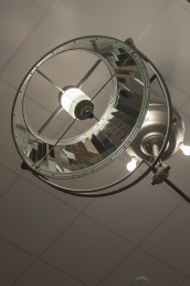 Light fixture in renovated medical classroom in Neuropsychiatric Institute remains from room's past as operating theater