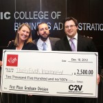 MBA students with first-place check for business plan competition.