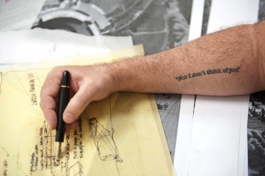 Dan Meis' tattoo, reading "But I don't think of you"