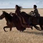 "Lope," movie still with man and woman riding horses