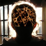 silhouette of girl with illustration of neurons over her head