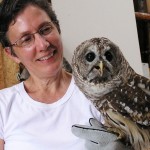 Maria Carrasco holding a barred owl