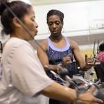 Moving Forward participant works out with a trainer