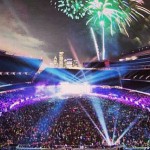 Crowd in Soldier Field with fireworks behind