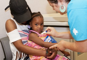 Girl receives vaccine