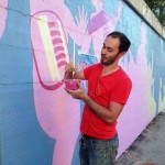 Nick Goettling painting mural
