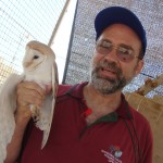 Joel Brown holding an owl
