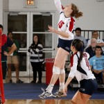 Sara Sternard spikes the volleyball