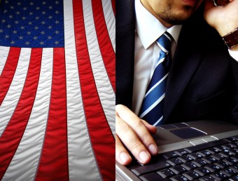 American flag and photo of man in tie at keyboard