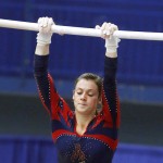 Catherine Dion on the uneven bars