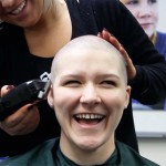 Young woman gets her head shaved