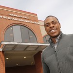 Curtis Granderson outside entrance to new stadium