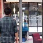 Student walking into the Undergraduate Success Center
