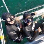 Jordan Corp in a diving basket with other study abroad students