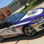 Tesla car decorated for "Drive for Men's Health"