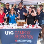 Campus Recreation members show off their biceps and their giveaways