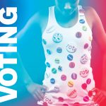 woman wearing tank top covered in "vote" buttons