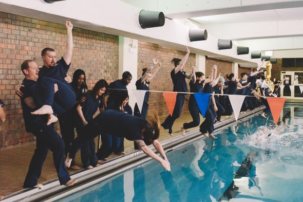 Nursing students jumping into the pool