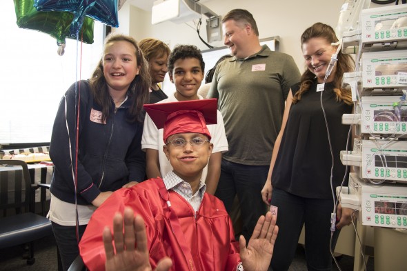 CHUI patient Isaiah Wright graduates from the 8th grade