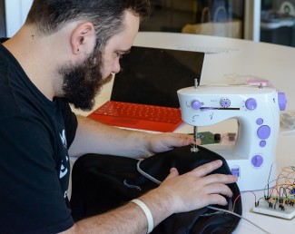 Viktor Mateevitsi sewing his spider sense suit