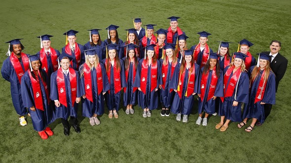 UIC athletes wearing graduation caps and gowns