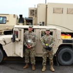 US Army Reserve members outside their Humvee