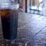 glass of cola on a table