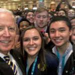 Joe Biden in student selfie with UIC student and ThLB brother Troy Tolentino in front row
