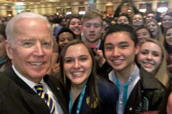 Joe Biden in student selfie with UIC student and ThLB brother Troy Tolentino in front row