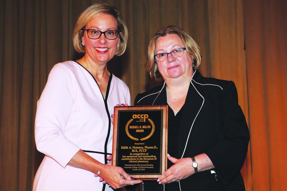 ACCP President Susanne Amato Nesbit and Edith Nutescu holding the Russell R. Miller award at the 2019 ACCP Annual Meeting. (Oct. 26-29, New York Hilton Midtown, New York, NY.)