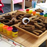 Play-Doh and wooden letters.