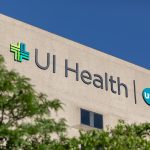 The east side of the University of Illinois Hospital displays the UI Health and UIC logo.