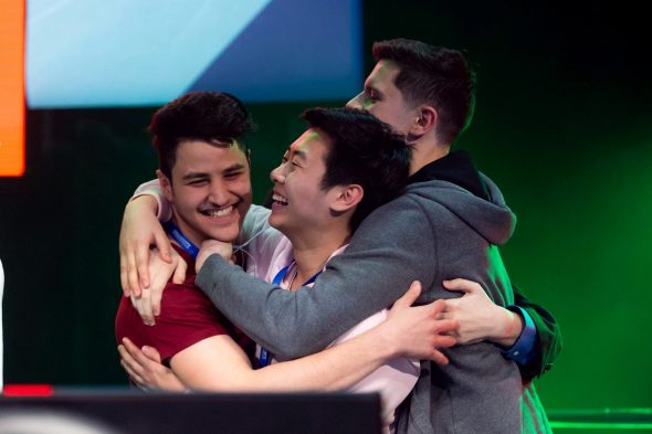DOTA 2 team members celebrate their win at the 2019 Collegiate StarLeague competition.