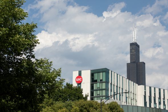 The ARC building with a backdrop of the Willis Tower.