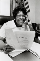 Congresswoman Cardiss Collins at her desk, circa 1985