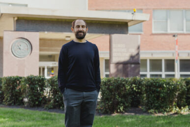 Headshot of Yochai Eisenberg, PhD in front of the Disability, Health, & Social Policy Building.