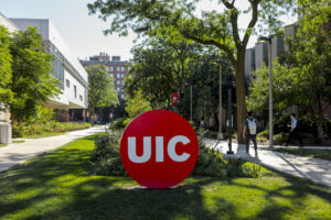 UIC circle mark on the west side of campus on a late summer day.