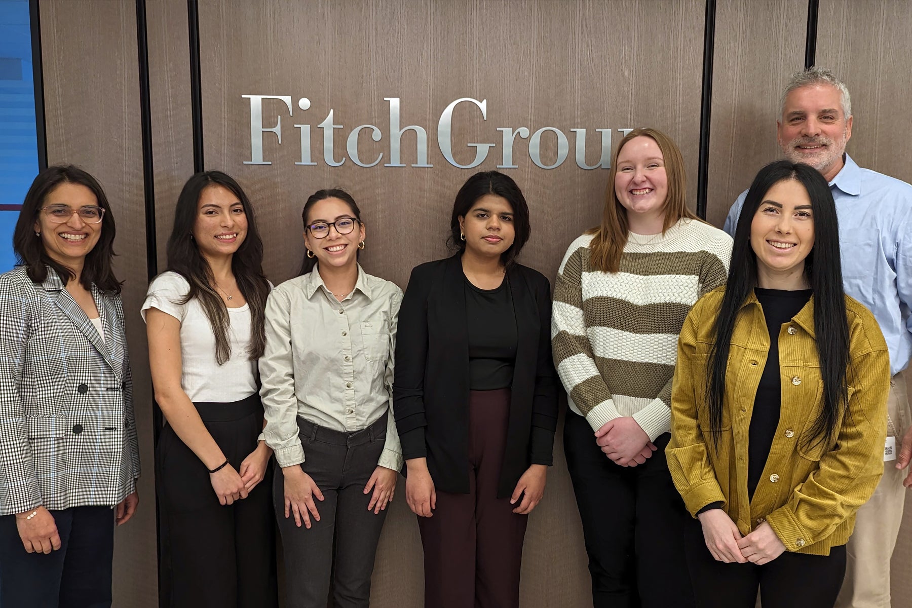 The Chicago Tech Circle team in the Fitch Group offices in Chicago. Left to right: Break Through Tech Director Amita Shetty, UIC students Fernanda Villalpando, Julieta Trejo, Falak Jamal, Andrea Knepper, Svetlana Voda and UIC Professor Dale Reed.